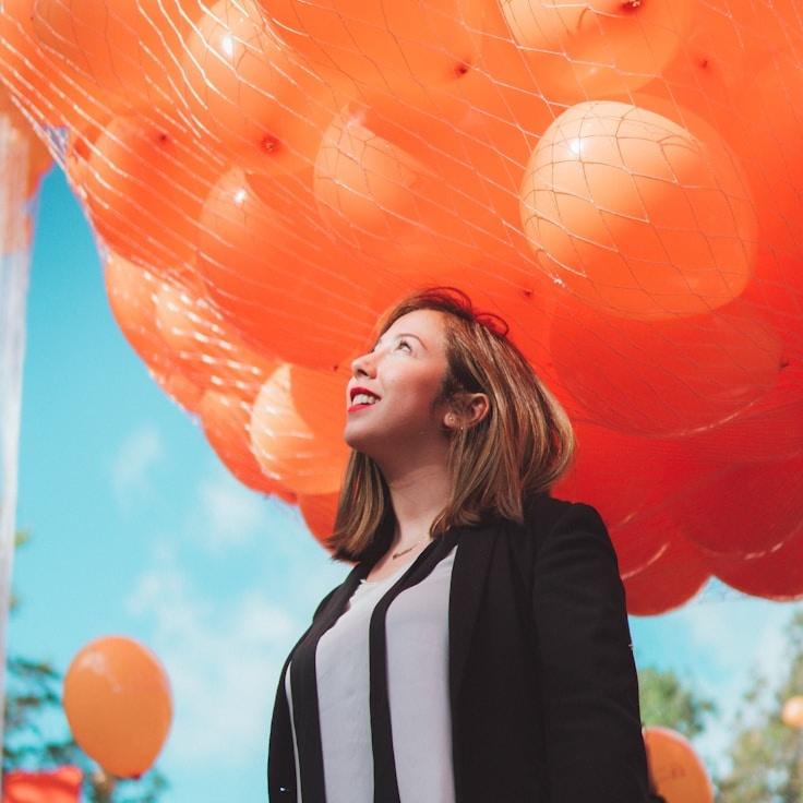 Priya Kapoor, Client Relations Director, discussing corporate gifting strategy with business clients